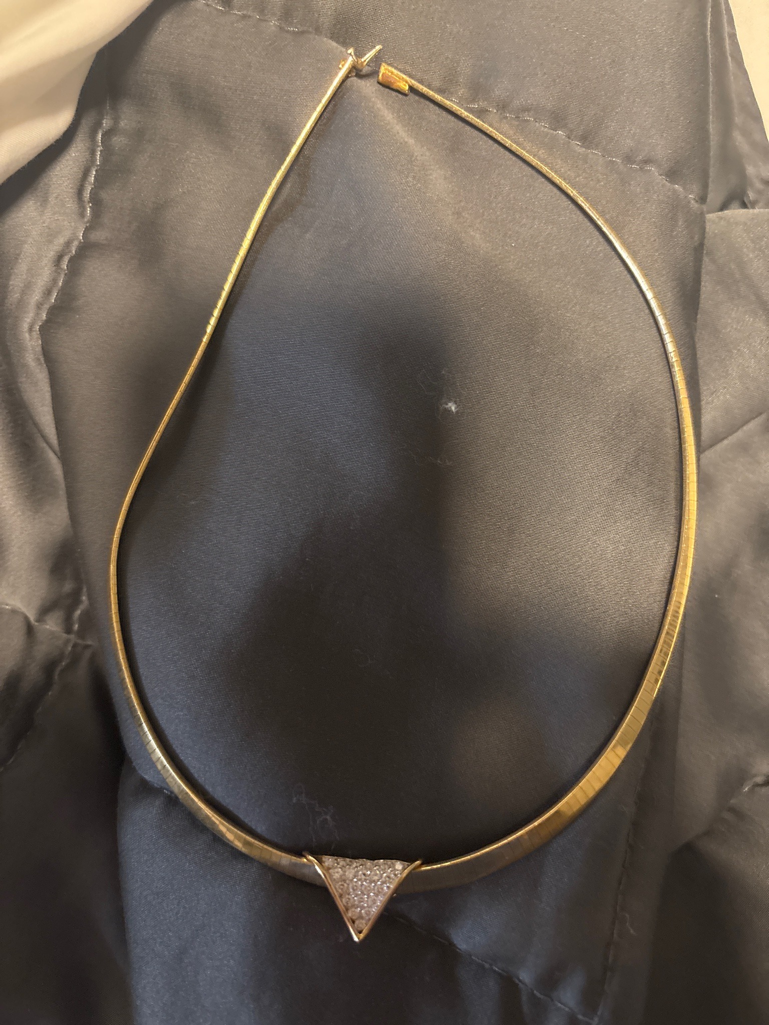 Submitted photo of Gold-tone omega chain necklace with pavé diamond-set triangle pendant (unauthenticated)