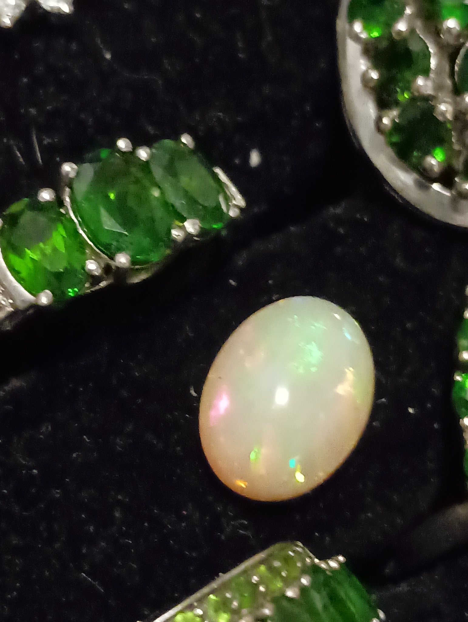Submitted photo of Loose oval cabochon white opal (unauthenticated)