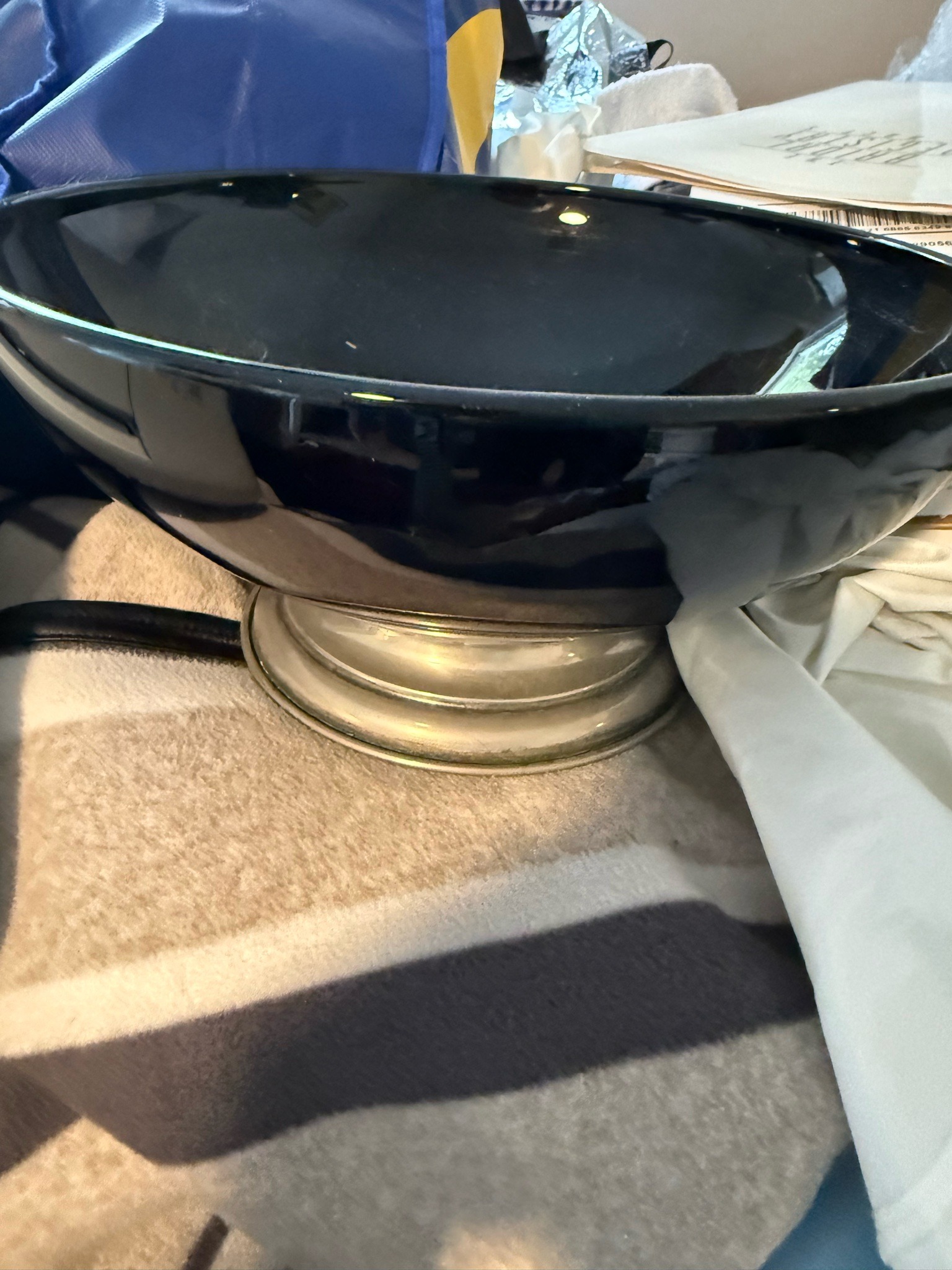 Submitted photo of Black glass bowl with metal base