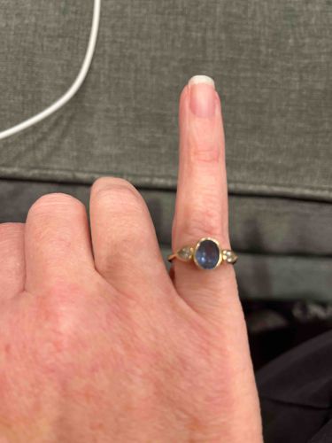 Oval Blue Sapphire and Diamond Accent Gold Ring
