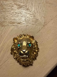 Vintage Gold-Tone Lion Head Brooch with Green Rhinestone Eyes