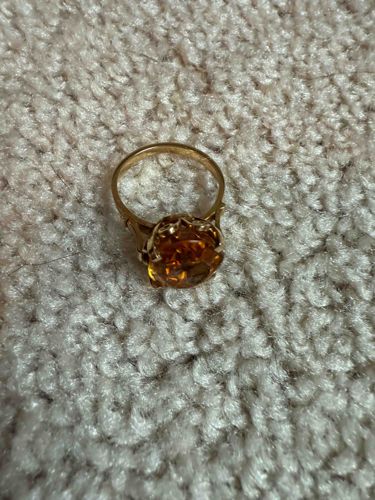 Gold-toned Ring with Orange Cabochon Gemstone