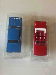 Pair of Blue Hardtop and Red Convertible Diecast Model Cars in Display Cases
