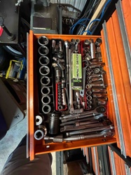 Mechanic's Tool Drawer filled with Sockets and Wrenches