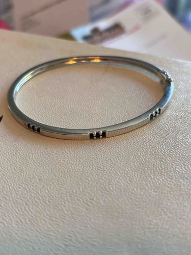 Silver-Tone Bangle Bracelet with Black Inlays