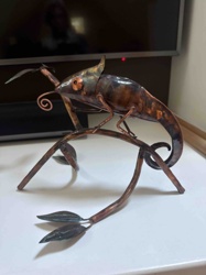 Patinated Metal Insect Sculpture on Branch