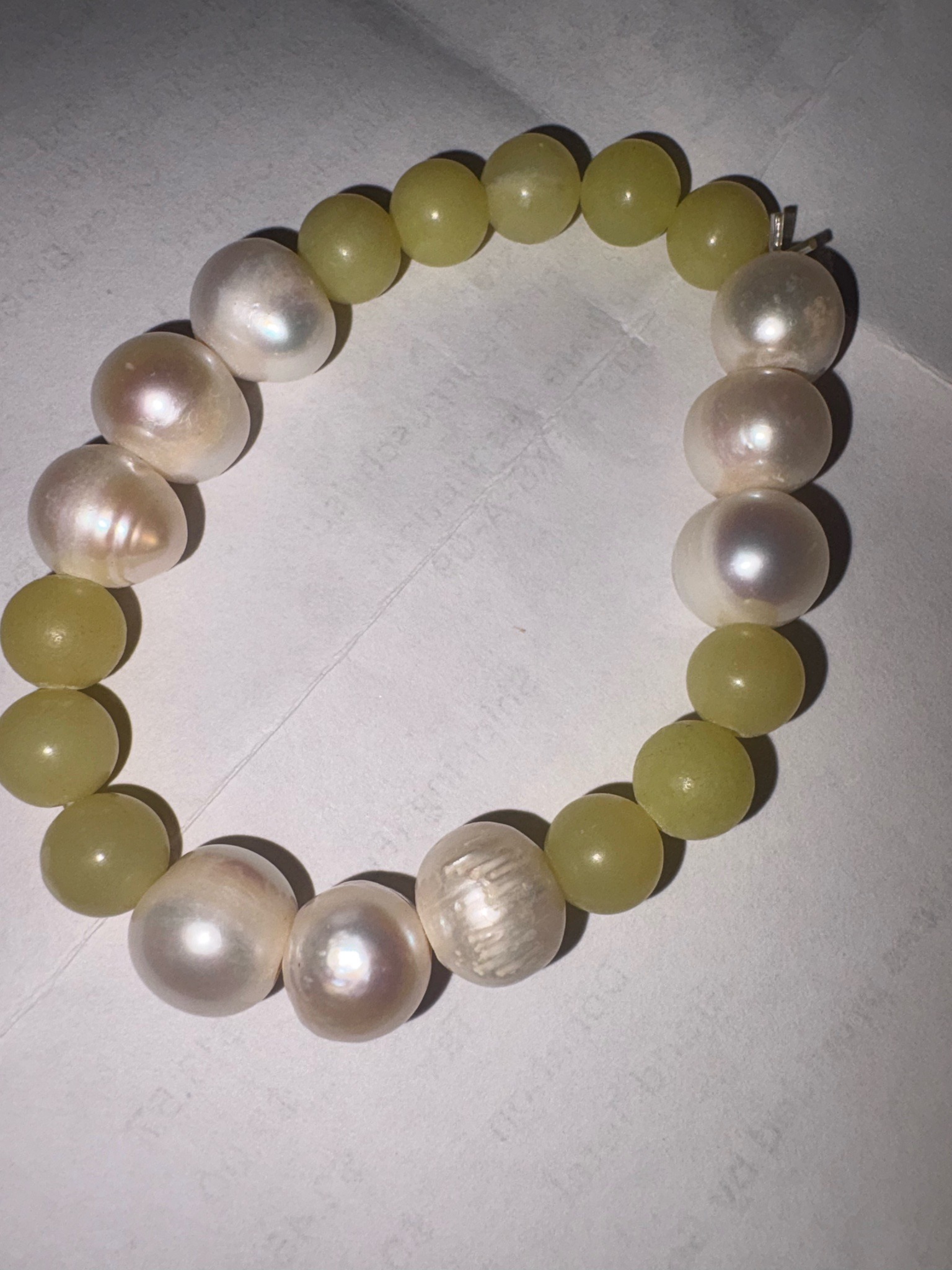 Submitted photo of Beaded bracelet with pale green stones and cultured pearls