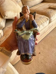 Figurine of an Elderly Woman Knitting