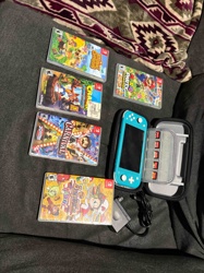 Nintendo Switch Lite Console with Games and Accessories