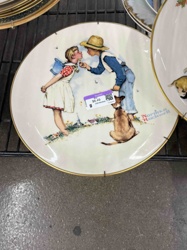 Norman Rockwell Collector Plate featuring 'First Kiss' or similar artwork