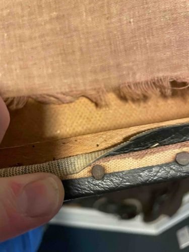 Upholstered Furniture Edge with Exposed Tacks