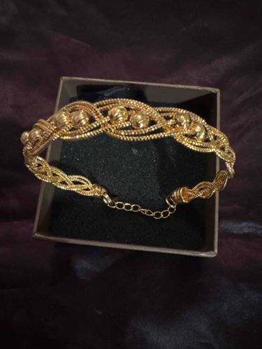 Braided Gold-Plated Bracelet with Textured Beads