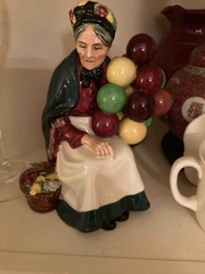 Old Woman with Balloons or Fruit Figurine