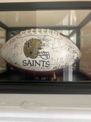 Autographed New Orleans Saints Football in Display Case