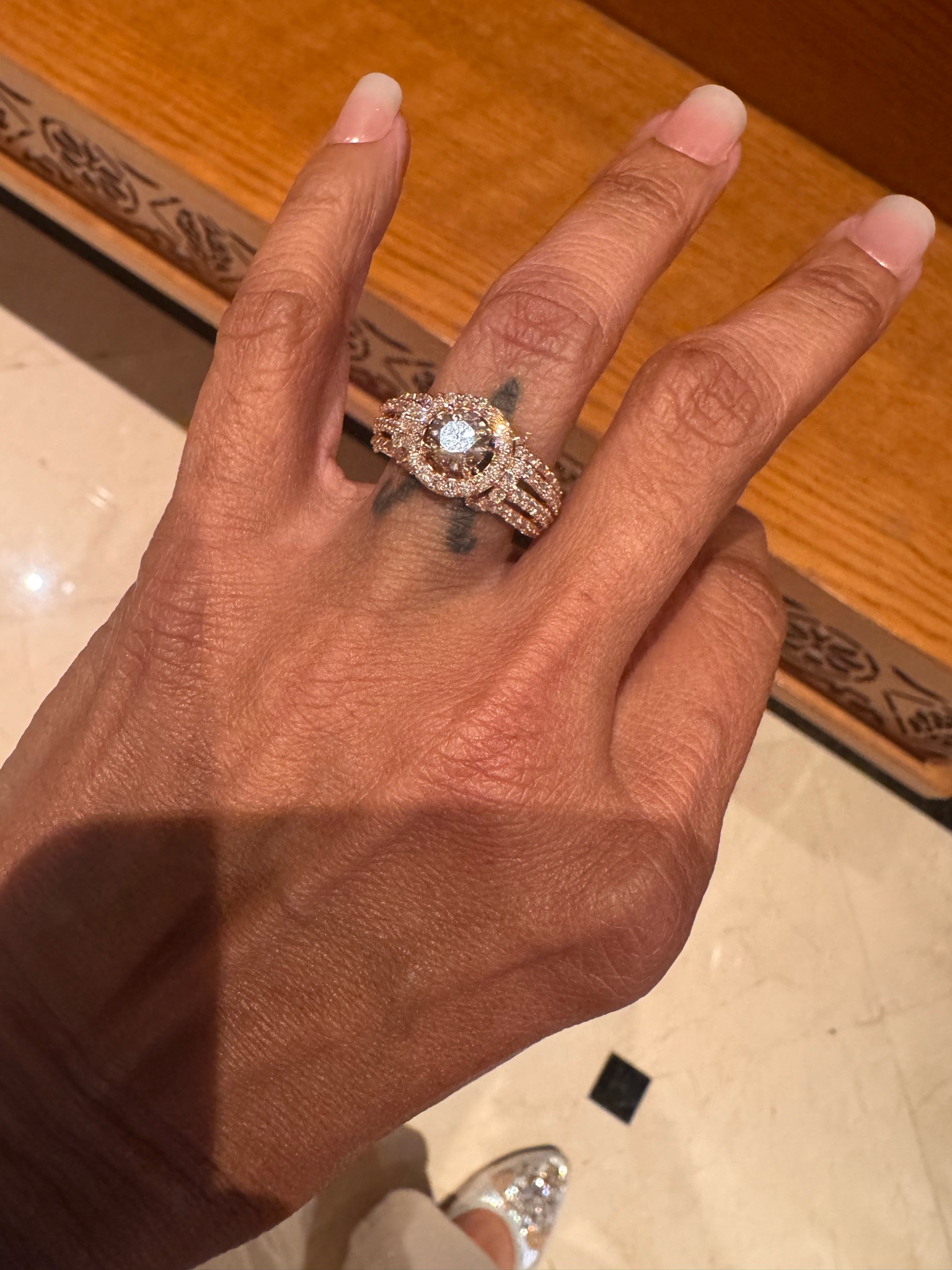 Submitted photo of Diamond and rose gold cluster ring (not authenticated)
