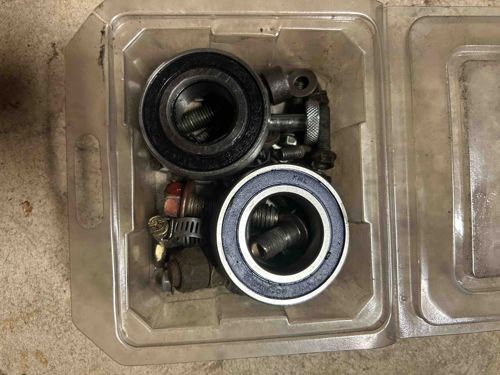 Assorted Ball Bearings and Fasteners in Plastic Case