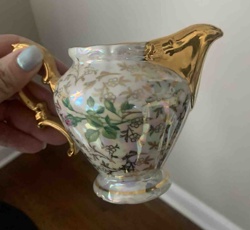 Iridescent Floral and Gilt Porcelain Creamer