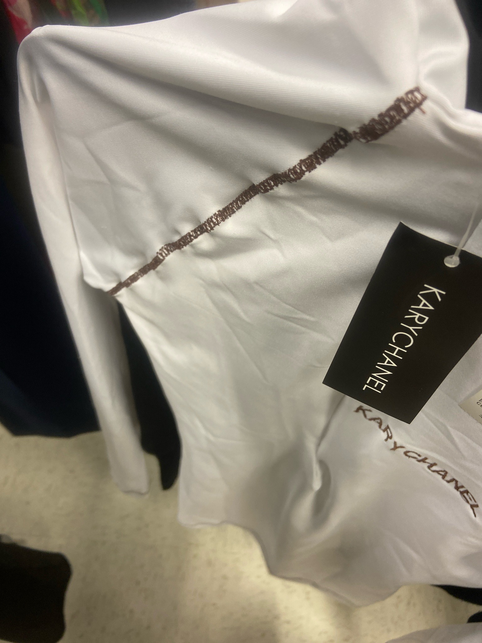 Submitted photo of Long-sleeve top bearing the name 'KARYCHANEL' (not authenticated)