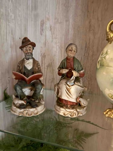 Elderly Couple Figurines (Man Reading, Woman Knitting)