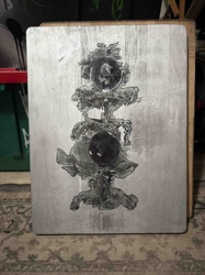 Abstract Totem-like Metallic Surface Print