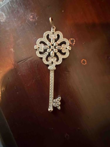 Tiffany & Co.'s Fleur de Lis Diamond Key Pendant