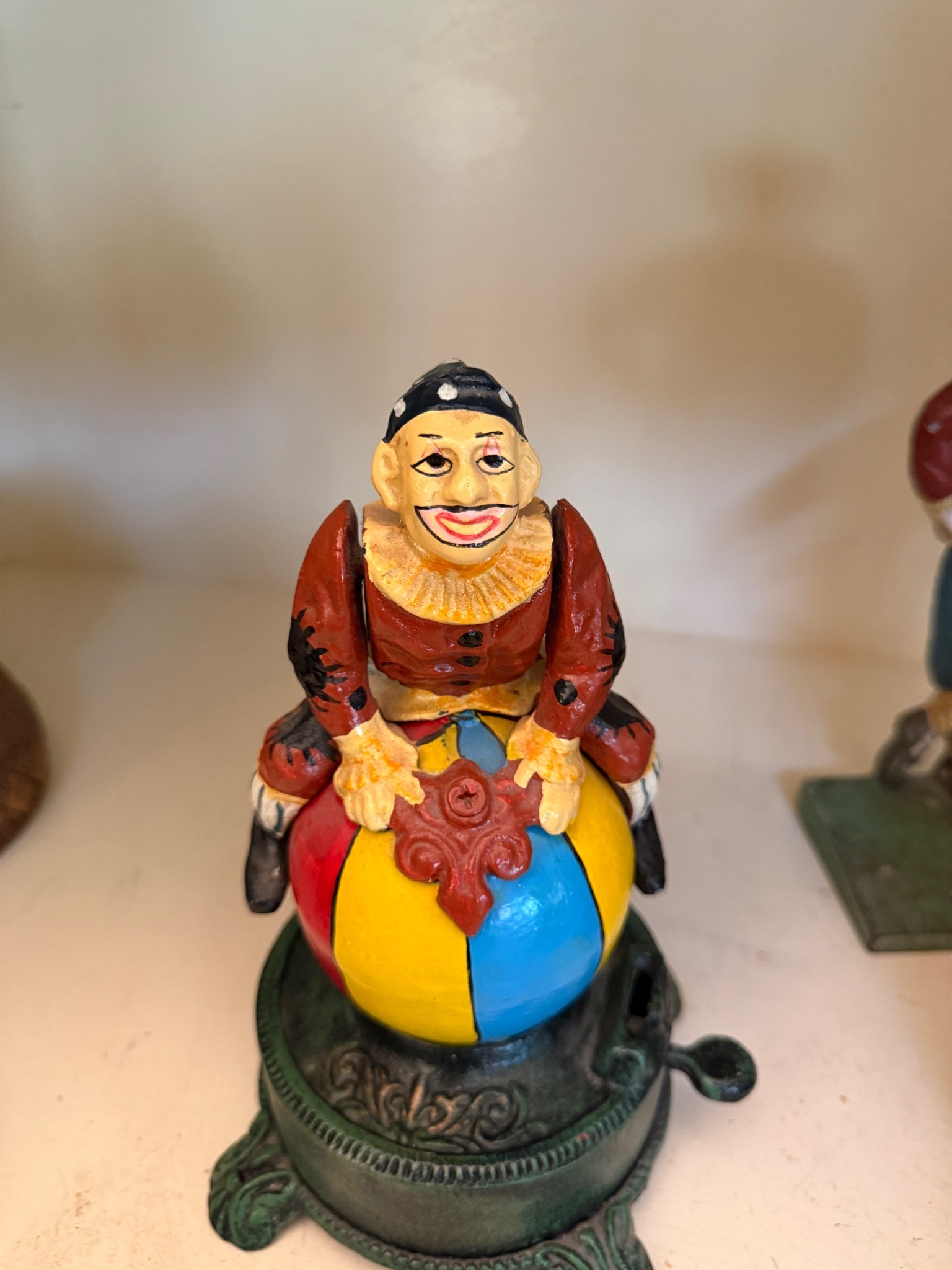 Submitted photo of Cast iron clown on a ball mechanical bank (not authenticated)