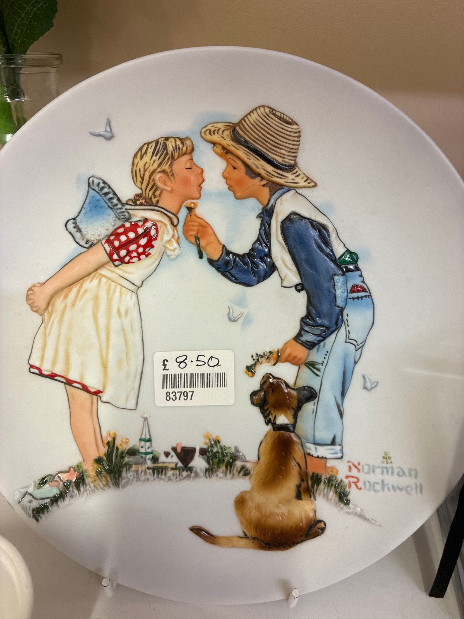Submitted photo of Decorative ceramic plate bearing a signature reading 'Norman Rockwell' (not authenticated)