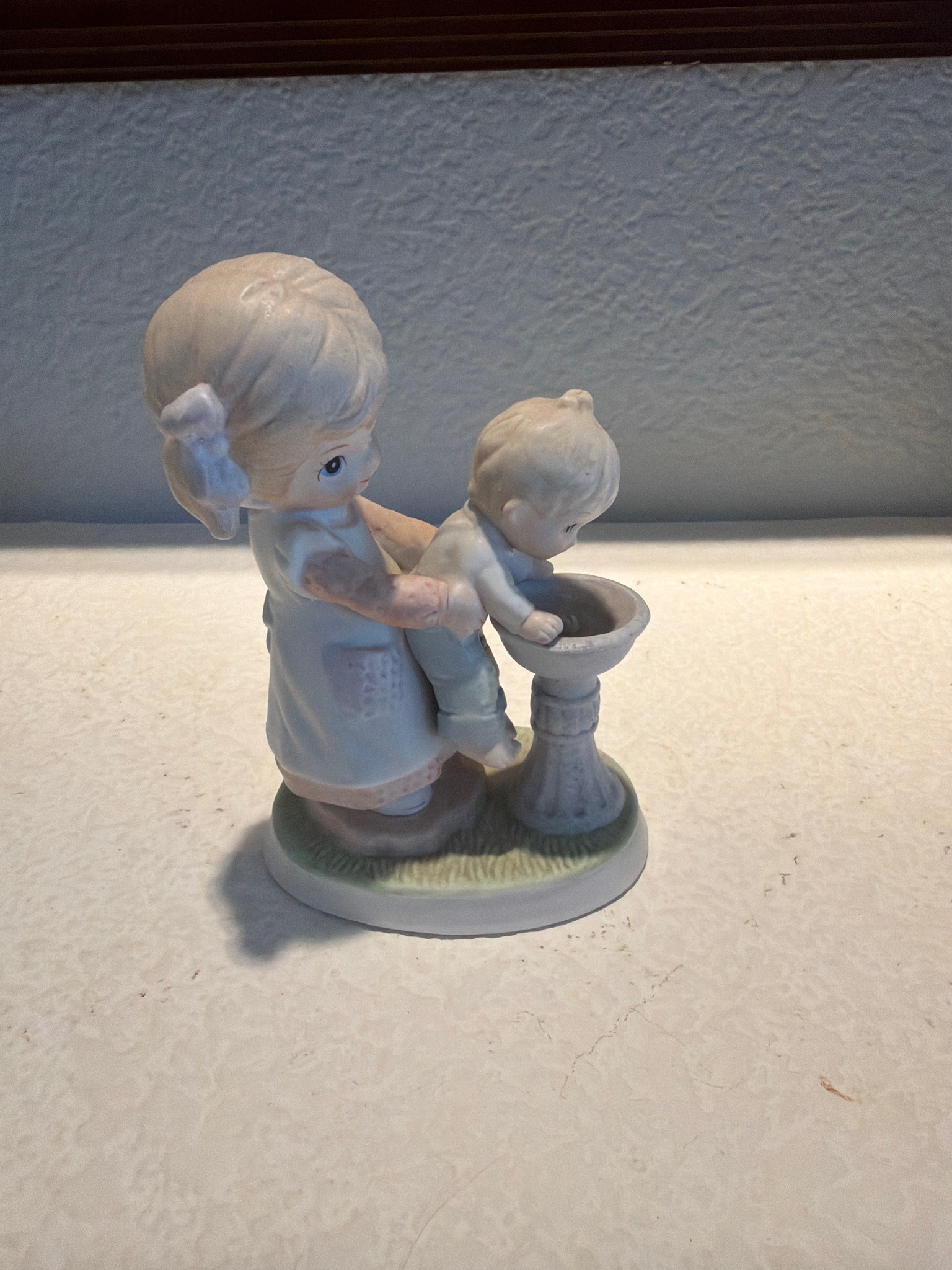 Submitted photo of Porcelain figurine, appears to be Precious Moments