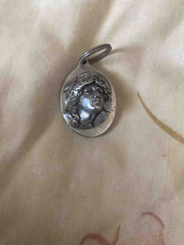 Classical Figure Relief Charm (dated 1980)