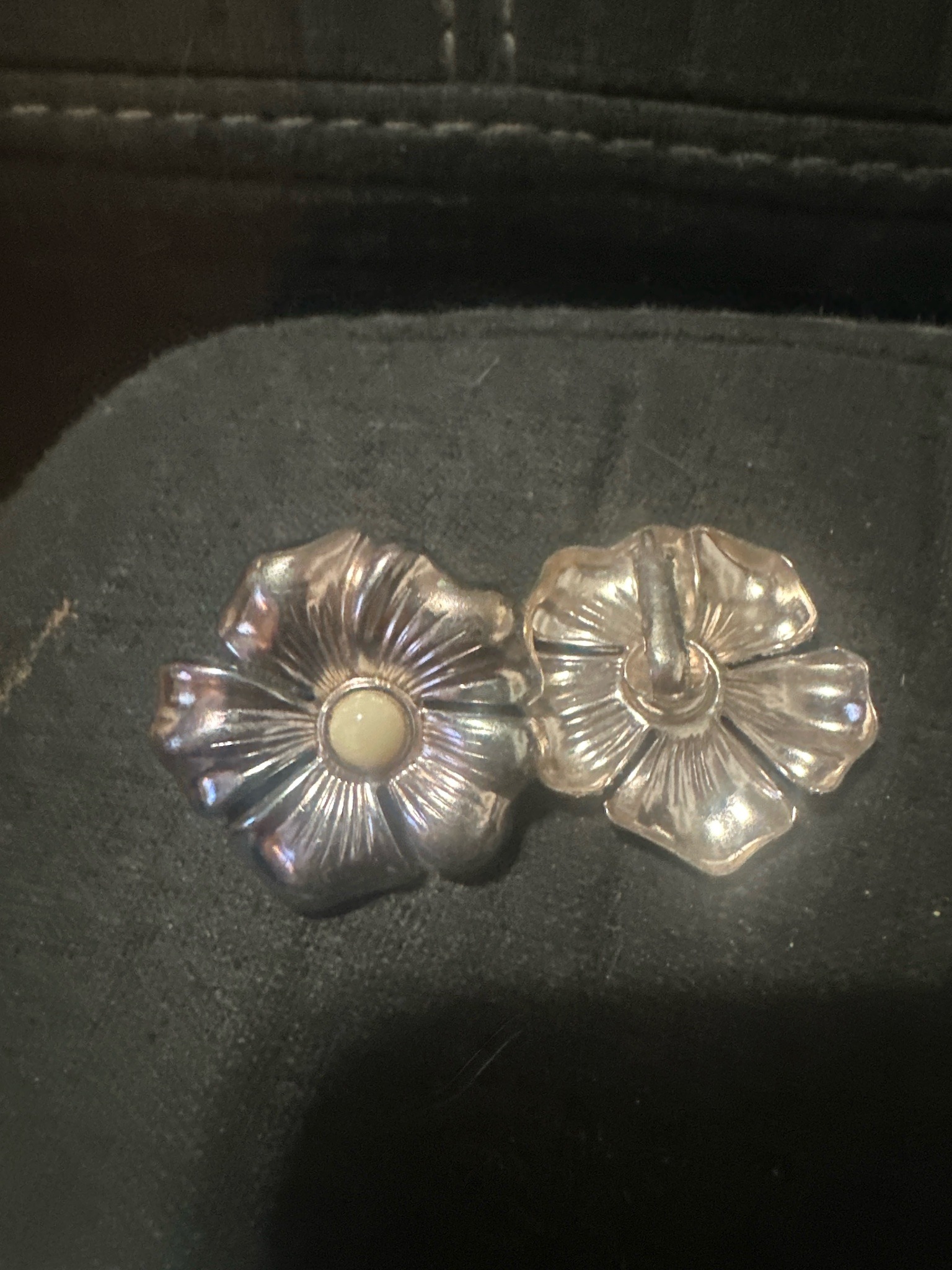 Submitted photo of Floral silver-toned buttons with central pearl-like cabochons