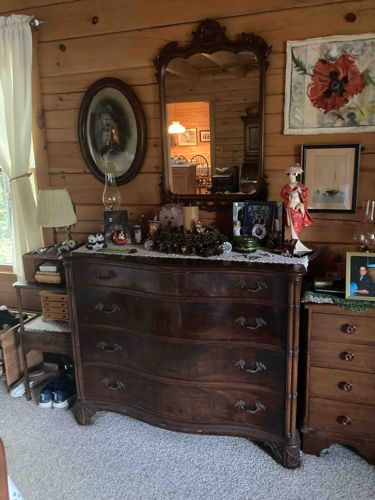 Antique Serpentine Front Dresser with Carved Details