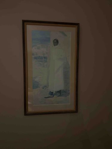 Framed Portrait of a Person in White Robe