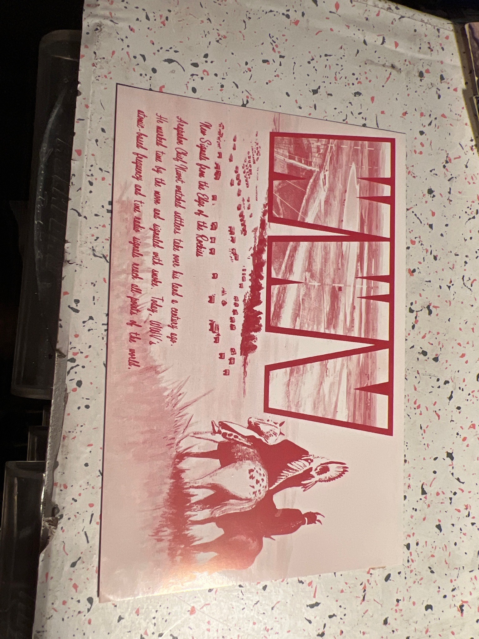 Submitted photo of Printed poster bearing the text 'WWV'