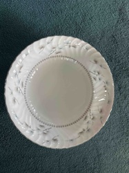 Porcelain Dinner Plate with Floral Motif and Scalloped Edge