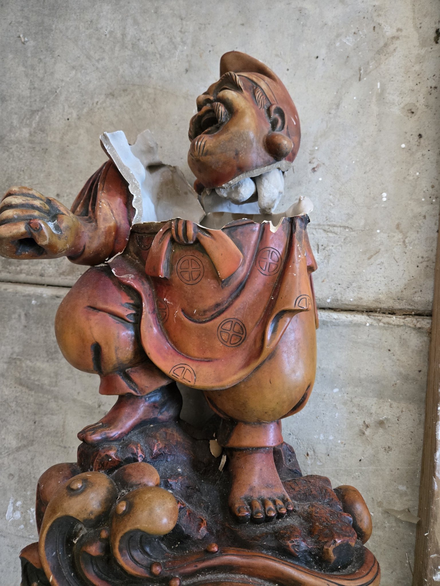 Submitted photo of Glazed ceramic figure of a traditional Asian character