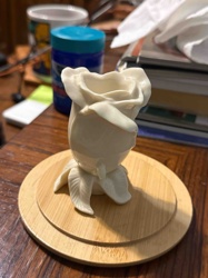 Carved Rose Bud Figurine on Wood Base