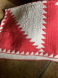 Red and Off-White Flying Geese Pattern Quilt