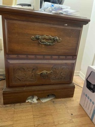 Two-Drawer Wooden Nightstand with Carved Details