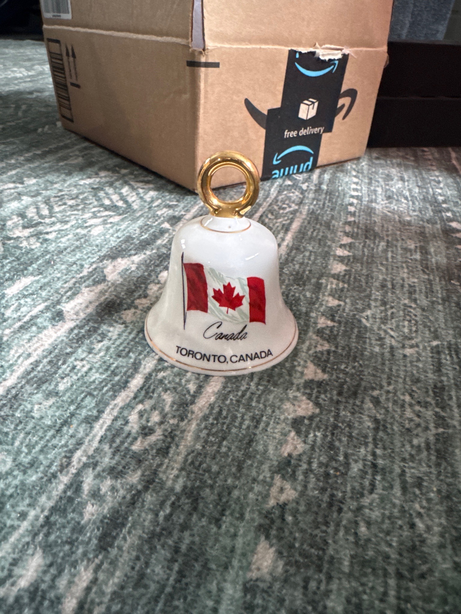 Submitted photo of Souvenir porcelain bell depicting the Canadian flag