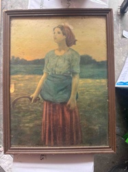 Framed Print of a Young Female Reaper at Sunset/Sunrise