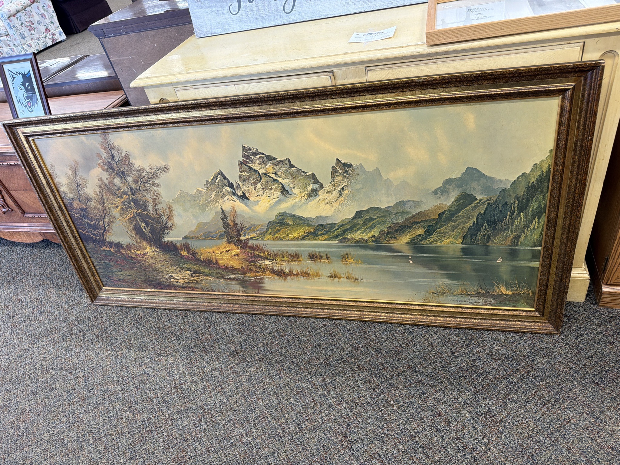 Submitted photo of Landscape painting depicting a mountain lake scene