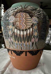 Sioux Pottery Vase with Native American Imagery