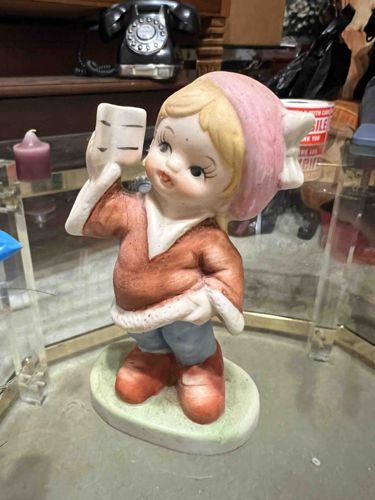 Porcelain "Caroler" Figurine