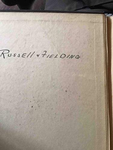 Old Book Endpaper with Inscription "RUSSELL & FIELDING"