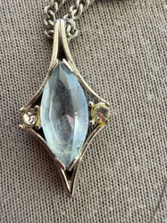 Marquise Cut Light Blue Stone Pendant with Accent Stones