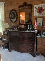 Antique Serpentine Front Dresser with Carved Details