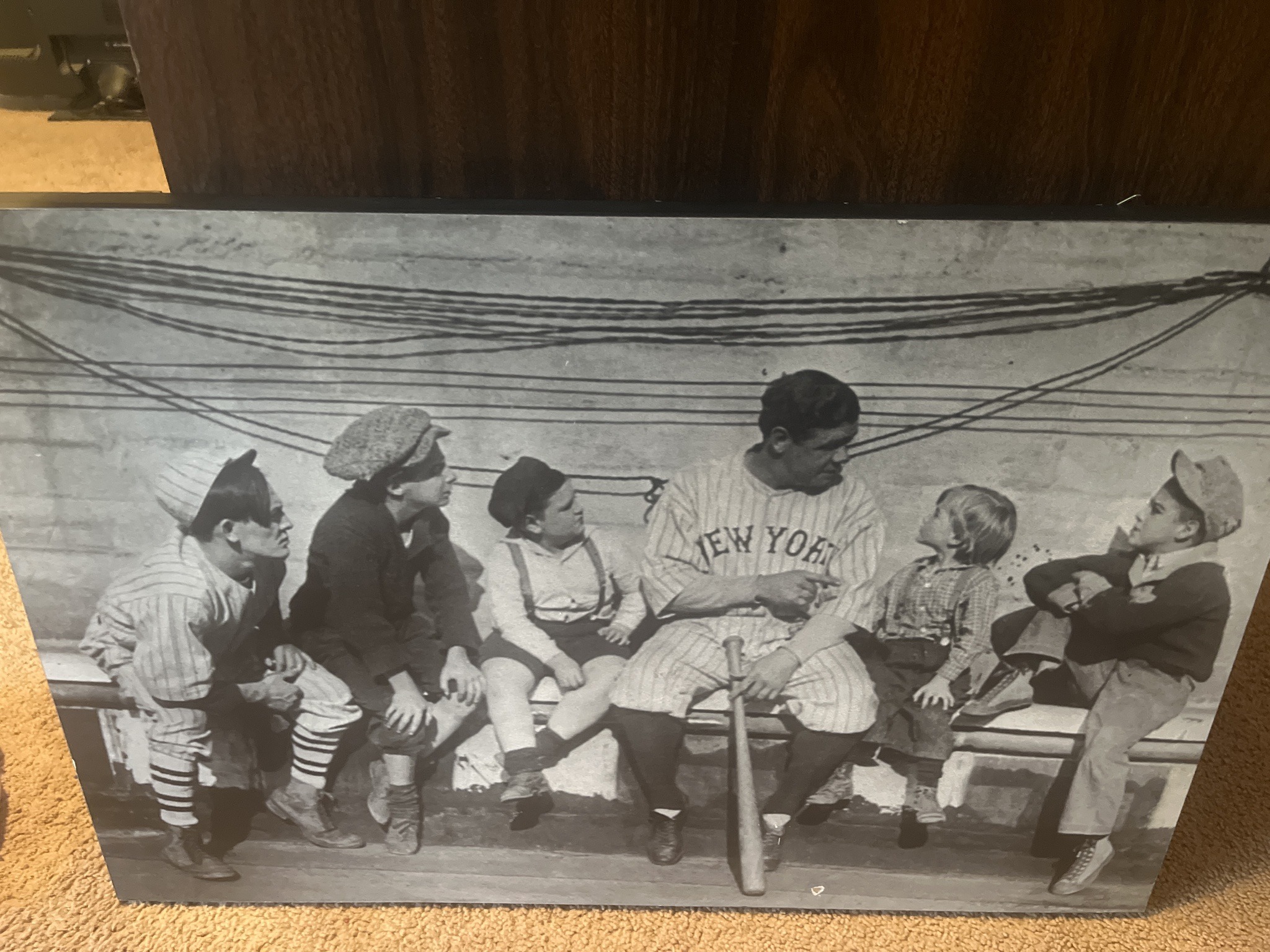 Submitted photo of Black and white photographic print depicting Babe Ruth with children (unauthenticated)