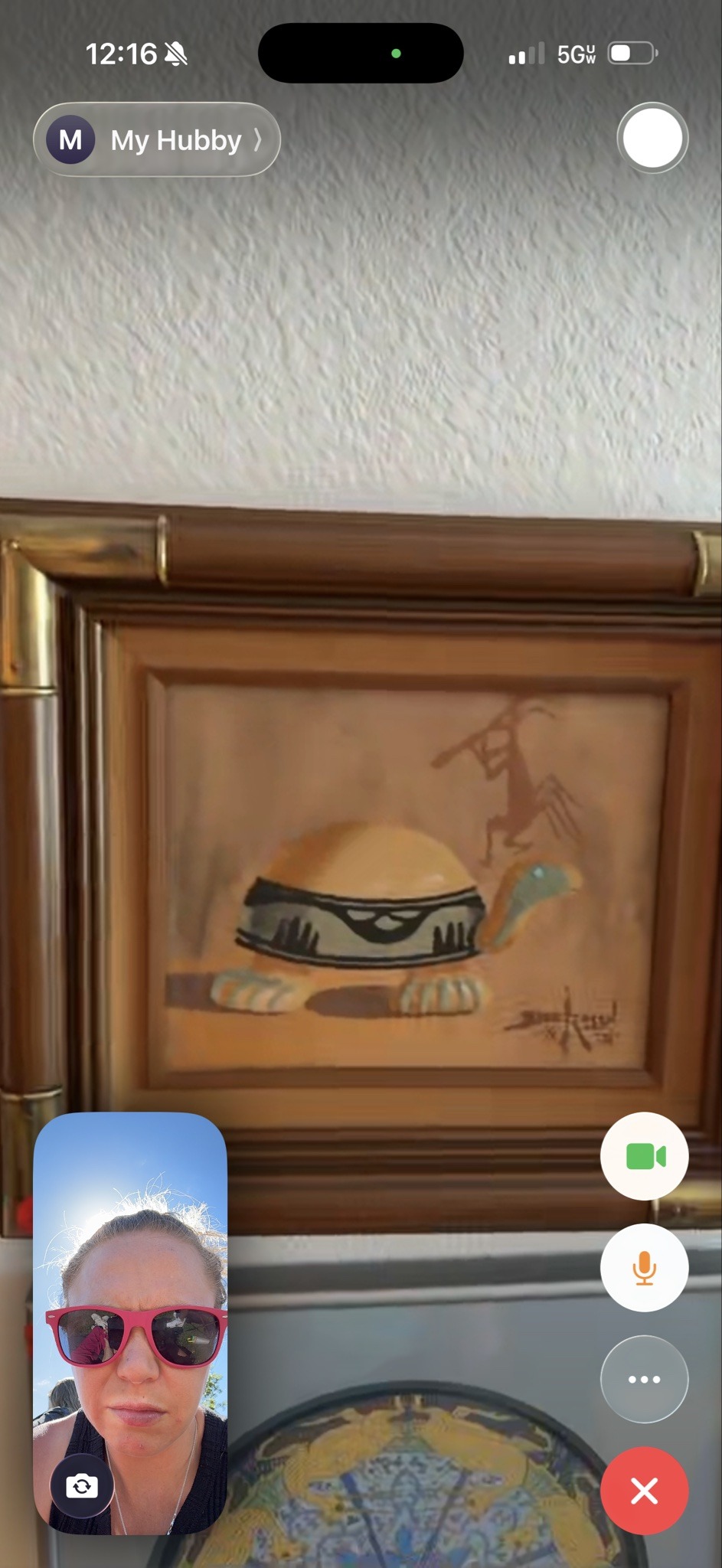 Submitted photo of Framed southwestern painting signed 'R. C. Gorman' (not authenticated)