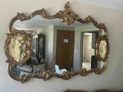 Ornate Rococo Revival Wall Mirror with Figural Reliefs