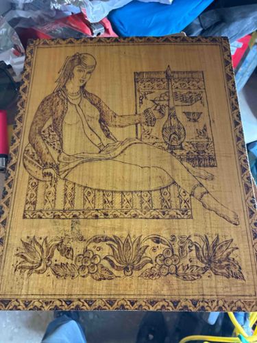 Wood Pyrography Panel featuring Seated Female Figure and Musical Instrument